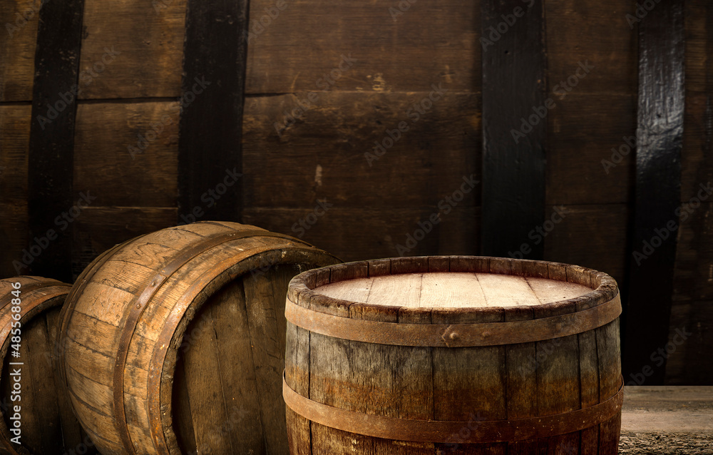 Fototapeta premium background of barrel and worn old table of wood