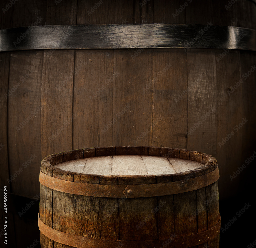 Fototapeta premium background of barrel and worn old table of wood