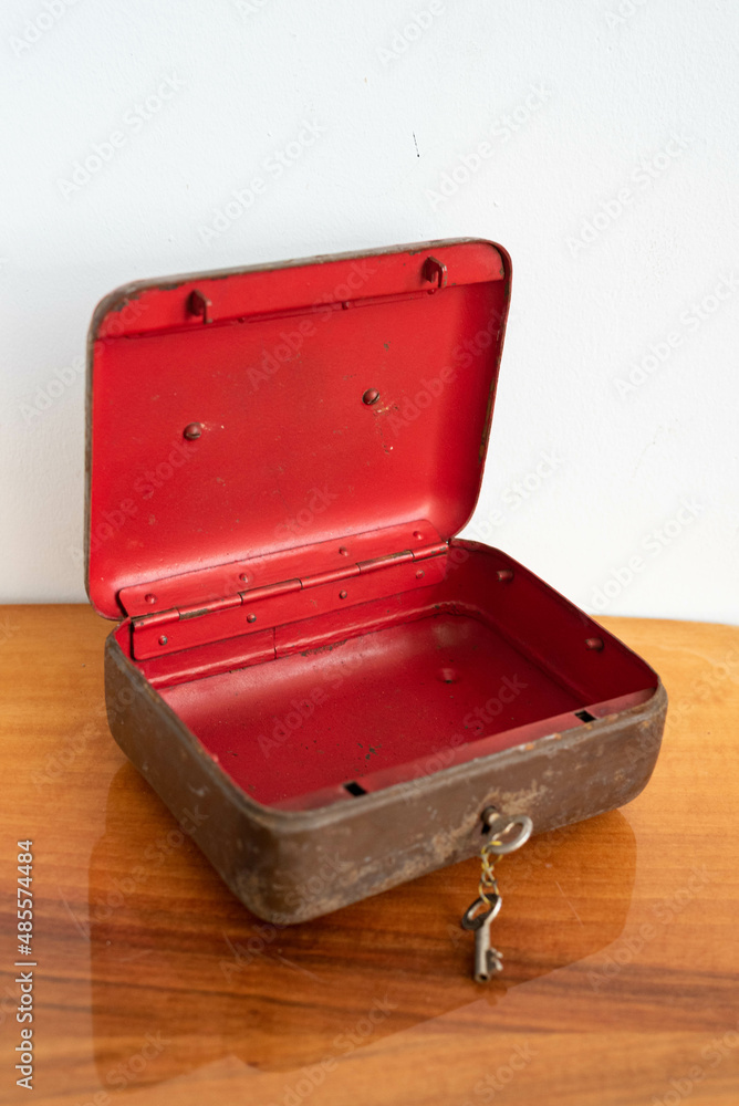 Vintage iron money case money holder metal box with a key Stock Photo