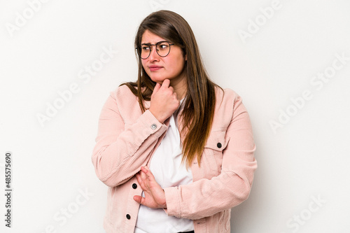 Young caucasian overweight woman isolated on white background suffers pain in throat due a virus or infection. © Asier