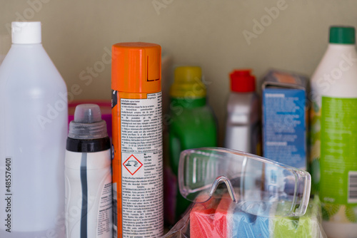 House cleaning agents and protective eyeglasses