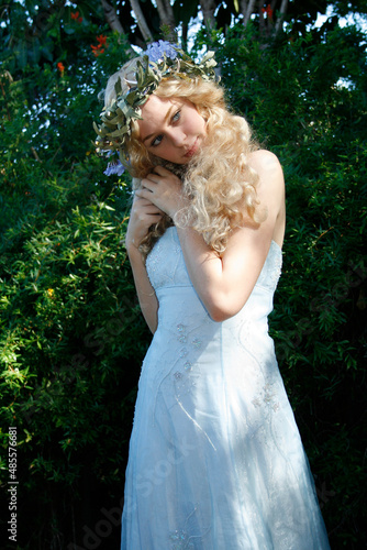 Slika na platnu portrait of blonde model wearing beautiful fantasy gown nada crown