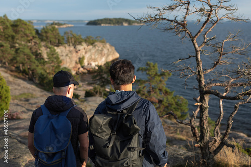Wallpaper Mural Men walking at sea Torontodigital.ca