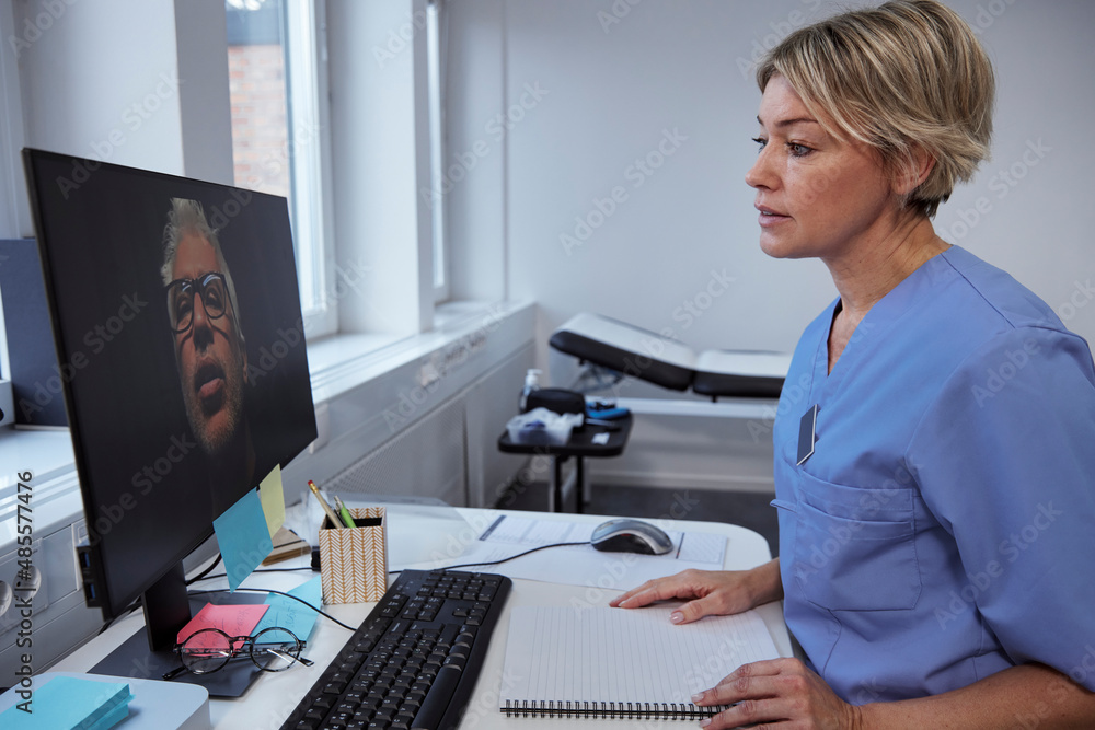 Female doctor having online consultation with senior patient Female doctor having online consultation with senior patient