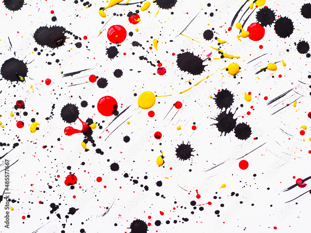 Picture painted using the technique of dripping. Mixing different colors white and black and red and yellow Picture painted using the technique of dripping. Mixing different colors white and black and red and yellow