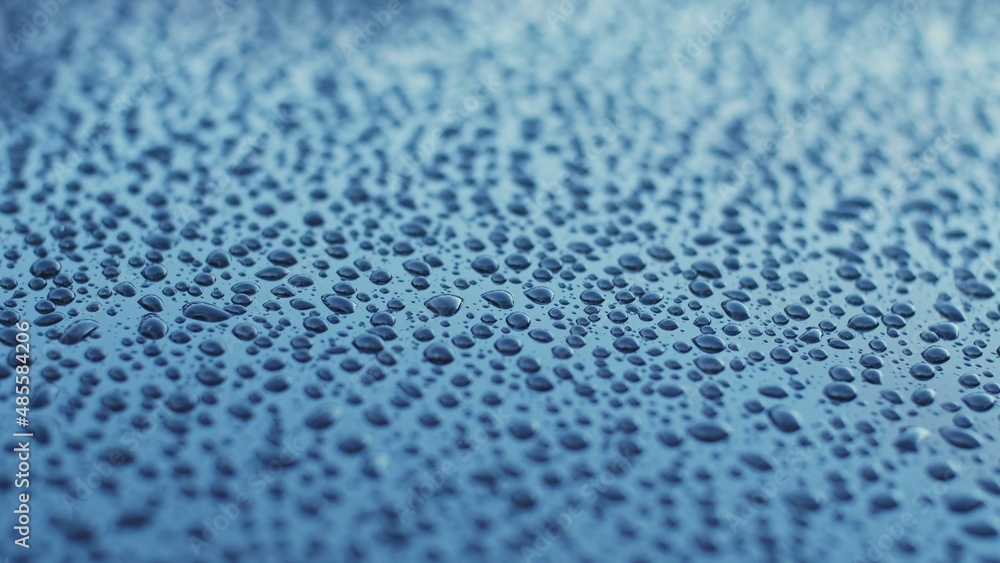 Crystal Clear Drops of Pure Rain Water on Flat Glossy Waterproof Hydrophobic Surface Crystal Clear Drops of Pure Rain Water on Flat Glossy Waterproof Hydrophobic Surface