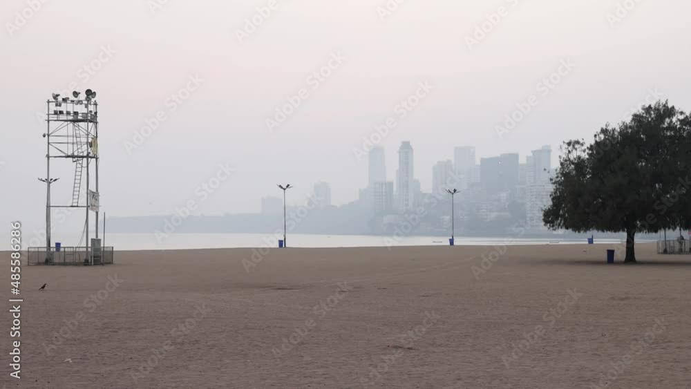 Wide view of Deserted Girgaon Chowpatty Beach, usually a busy tourist destination but now empty because of lockdown amidst rising Covid-19 cases. Mumbai, Maharashtra, India. 4786. Wide view of Deserted Girgaon Chowpatty Beach, usually a busy tourist destination but now empty because of lockdown amidst rising Covid-19 cases. Mumbai, Maharashtra, India. 4786.
