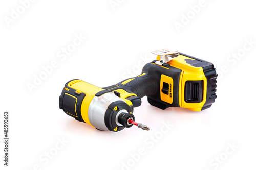 The yellow and black cordless battery powered drill isolated on white background.