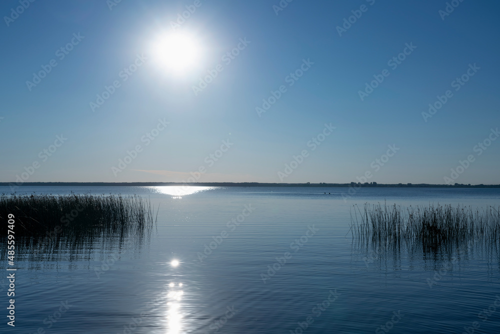 Beautiful panorama of dramatic sunset over the sea. Copy space. Horizontal image.