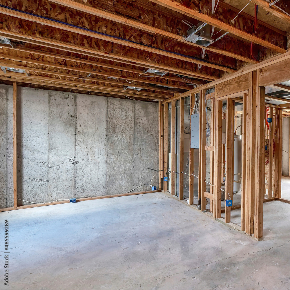 Square Wooden frameworks inside an unfinished basement of a house Square Wooden frameworks inside an unfinished basement of a house
