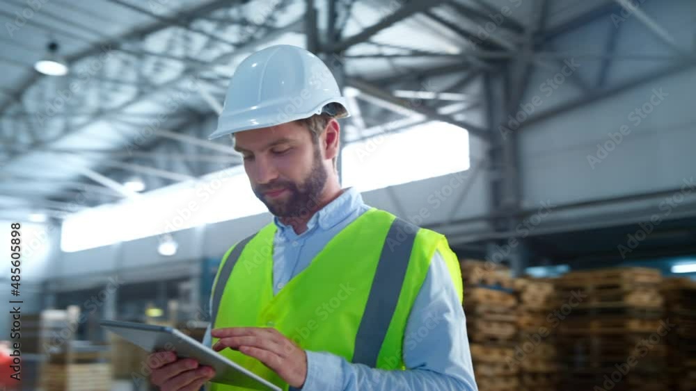 Portrait factory employee tablet checking analysing production supply smiling Portrait factory employee tablet checking analysing production supply smiling