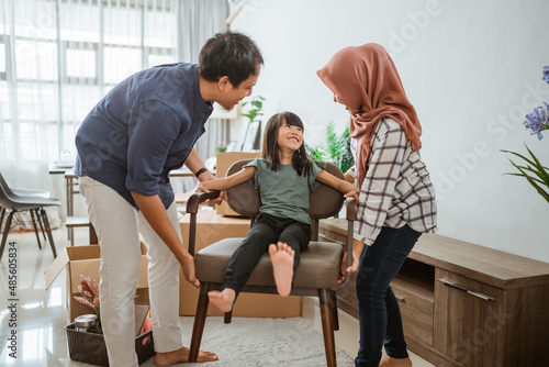 muslim asian family moving to new home