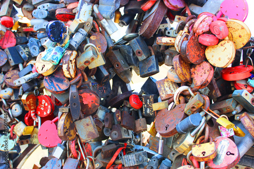 Locks of love, Valentine's Day or wedding day. Locks with a lock of love on the bridge, locks (symbols of love for love. new romantic attraction on the boardwalk Novosibirsk, Russia, August 25, 2021