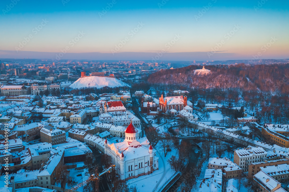 Vilnius city at winter, bright warm colors at cold winter evening