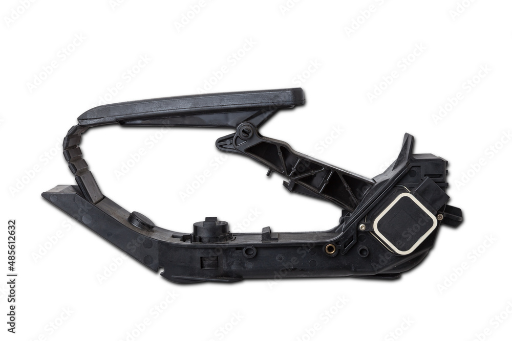 Obraz premium Gas pedal on a white isolated background in a photo studio for sale in a car service. Black auto part for replacement during repair in the workshop. Spare part junkyard