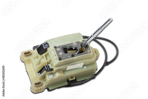 Spare part on a white isolated background in a photo studio for sale at an auto-parsing or replacement in a car service center - Automatic transmission selector gear lever with plastic elements.
