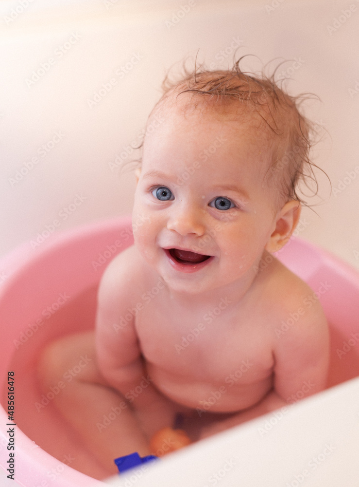 Happy smiling baby taking a bath. High quality Happy smiling baby taking a bath. High quality