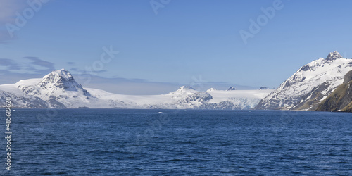 Snow covered mountains and glaciers, King Haakon Bay, South Georgia, South Georgia and the Sandwich Islands, Antarctica photo