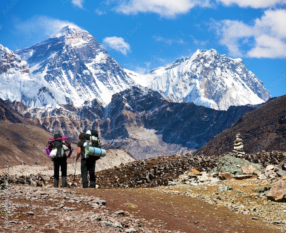 Mount Everest and Lhotse with two tourists