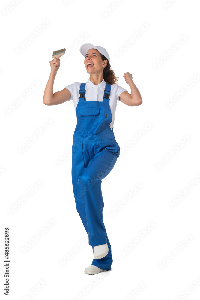 Female house painter with paint brush Female house painter with paint brush