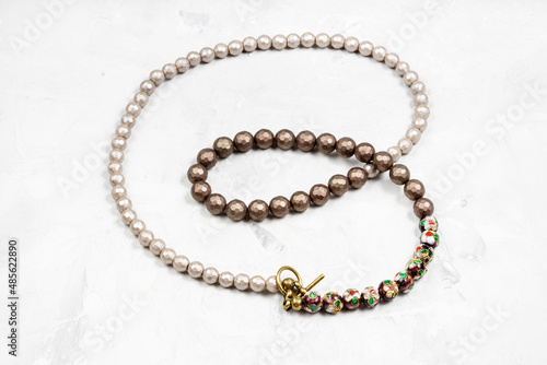 handcrafted necklace from faceted nacre beads