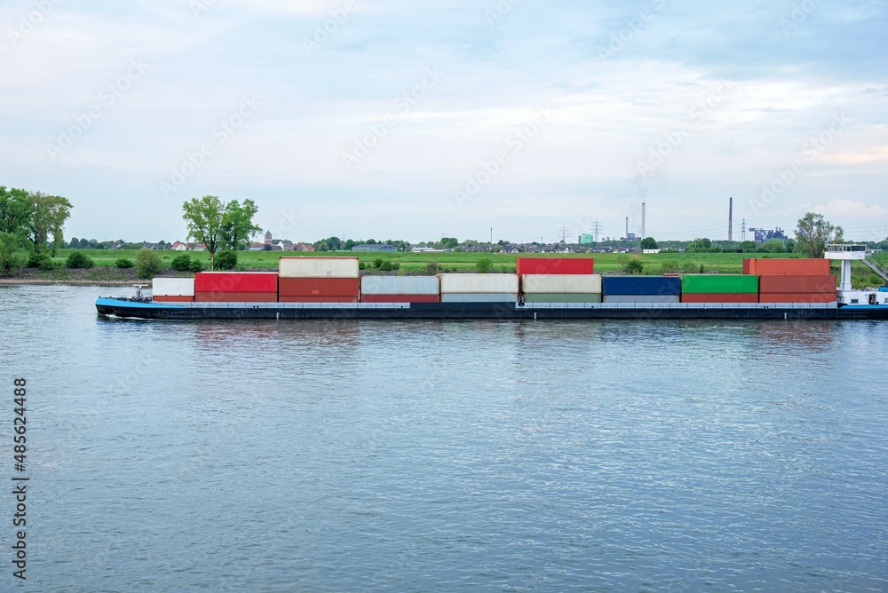 Cargo ship in port, river transport