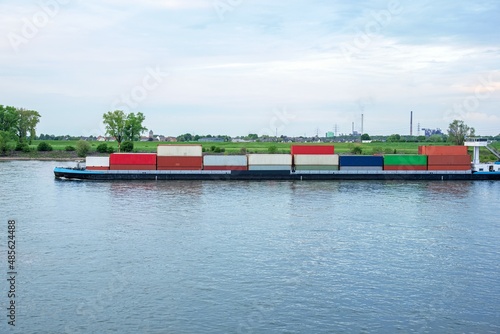 Obraz na płótnie Cargo ship in port, river transport w salonie