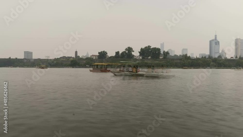 Polluted lake in downtown Nanjing, China photo