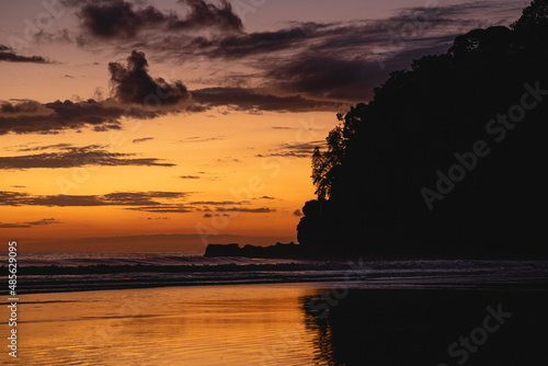 landscape of a beautiful sunset without people at Hermosa beach in Costa Rica