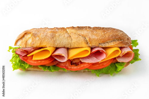 Sandwich from a wheat bun with bacon, cheese and salad. Isolated on white background. Fast food for take and go cafe