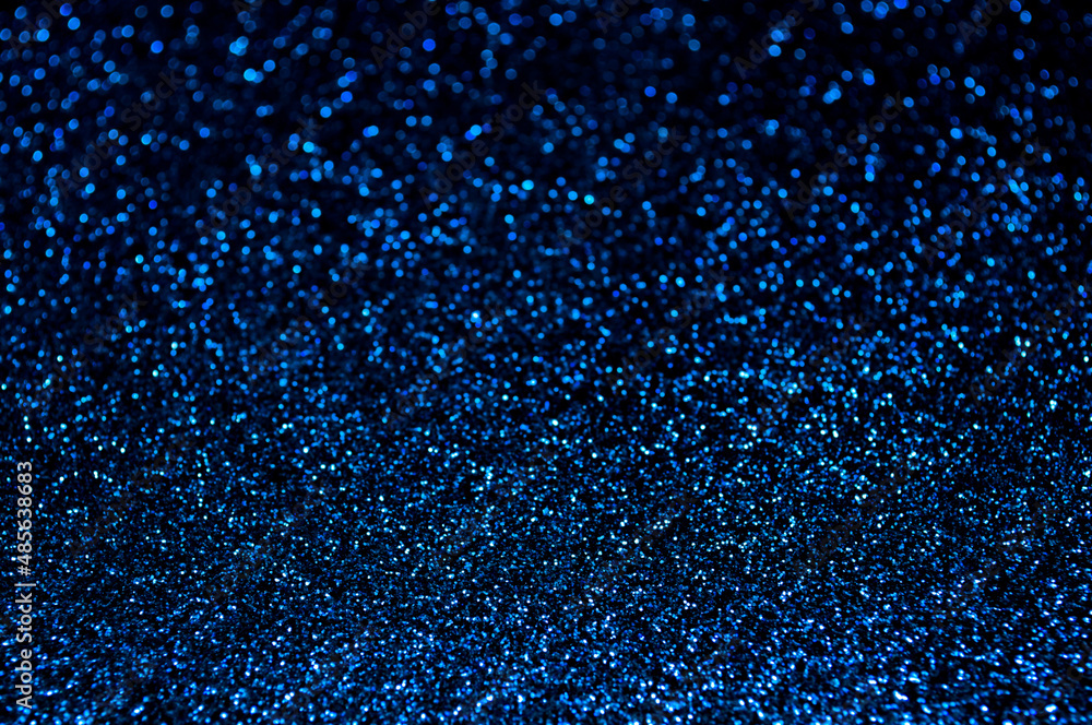 Obraz premium Deep Blue,white and white colors abstract light background, Blue shining lights, sparkling glittering ,winter,Christmas lights. Blurred abstract holiday background.