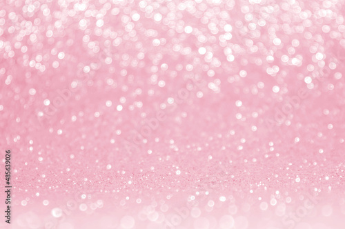 Pink gold, pink rose bokeh,circle abstract light background,Pink Gold shining lights, sparkling glittering Valentines day,women day,event lights romantic backdrop.Blurred abstract holiday background..