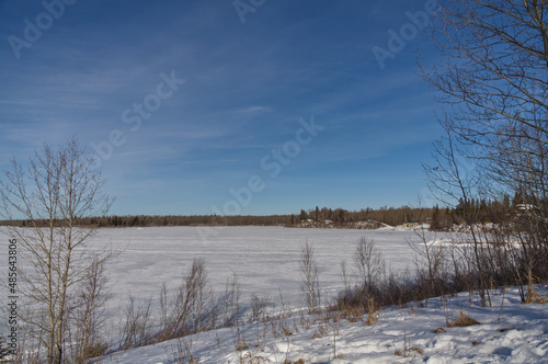 Frozen Astotin Lake on a Partially Cloudy Winter Day