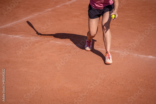 shadow woman tennis player on an outdoor clay court © edojob