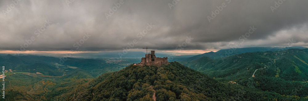 Aerial view of Castel de Montsoriu, a medieval and gothic stronghold on hilltop, Girona, Spain. Aerial view of Castel de Montsoriu, a medieval and gothic stronghold on hilltop, Girona, Spain.