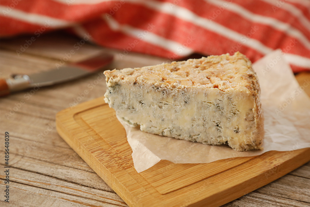 Cabrales, spanish blue cheese on rustic background Cabrales, spanish blue cheese on rustic background