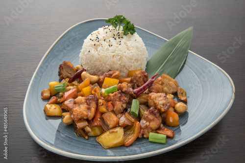 Photography Stir fry chicken cashew nuts, Typical Thai main dish with fried chicken, peppers