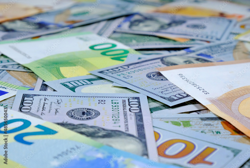 Money. Euro and us dollars banknotes. Background of dollars and european currency Money. Euro and us dollars banknotes. Background of dollars and european currency