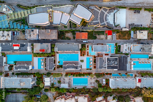 Aerial view of swimming pools from luxury hotels along the beach in Heraklion, Crete, Greece. photo