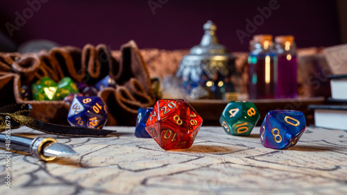 Close-up of a red d20  and d10