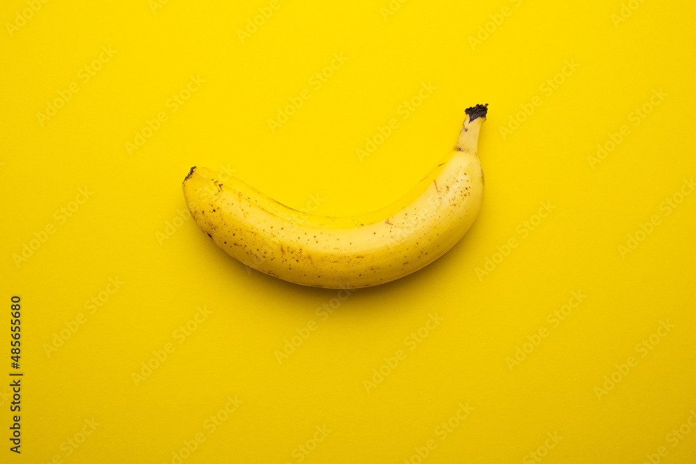 Sweet banana on the yellow background Sweet banana on the yellow background