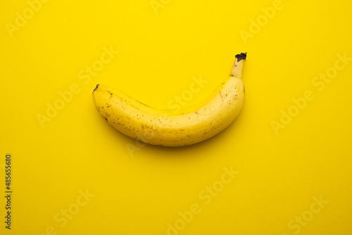 Sweet banana on the yellow background