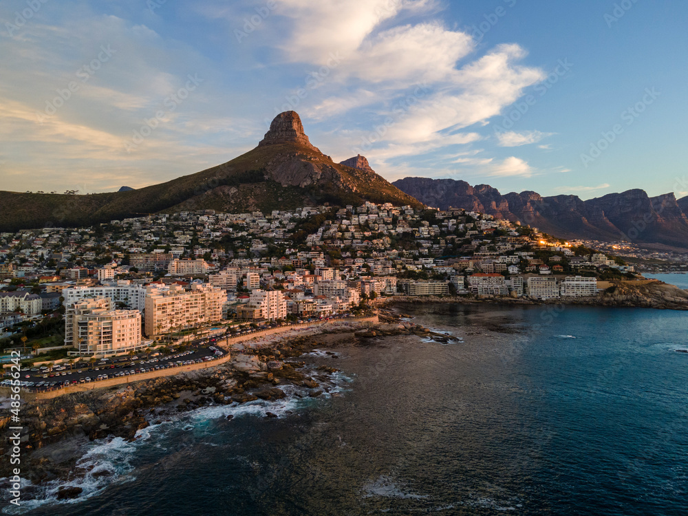 Aerial view of Atlantic Seaboard sunset with Lion’s Head Mountain, Bantry Bay and Sea Point from Atlantic Ocean, Cape Town, South Africa. Aerial view of Atlantic Seaboard sunset with Lion’s Head Mountain, Bantry Bay and Sea Point from Atlantic Ocean, Cape Town, South Africa.