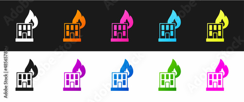 Set Fire in burning building on city street icon isolated on black and white background. Destroyed city on fire. Vector