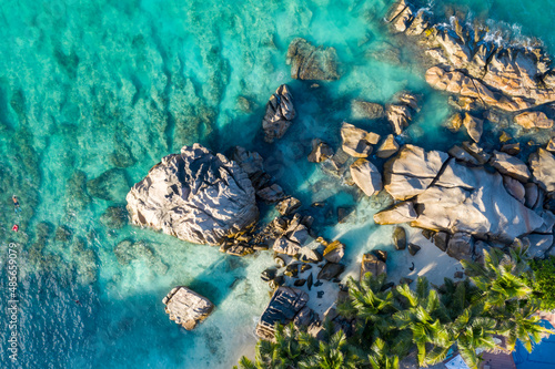 Aerial view of rocks along the coastline facing the Indian Ocean at Anse Severe, La Digue and Inner Islands, Seychelles. photo