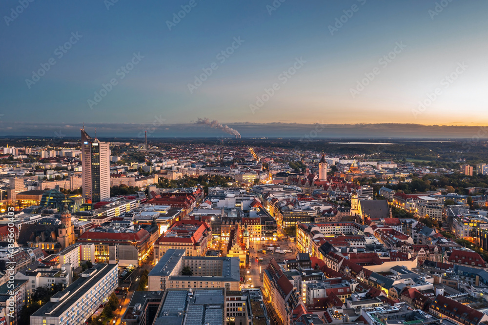 Cityscape of Leipzig (Saxony, Germany). Aerial night view over illuminated Zentrum city district. 