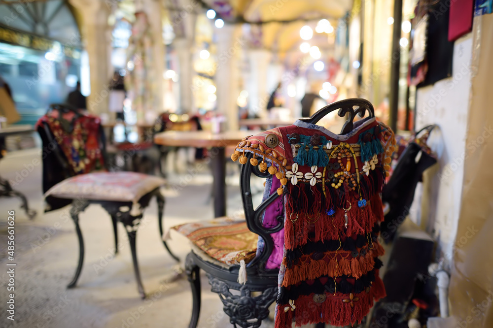 Decorated chairs and a table in a small cafe at the Grand Bazaar market in Istanbul, Turkey.