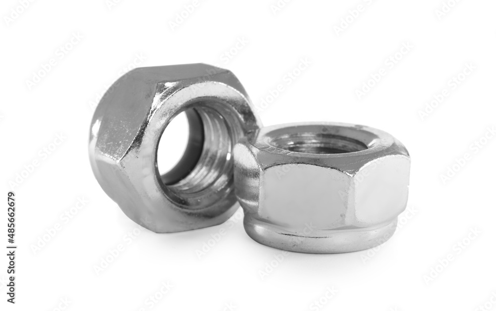 Two metal nyloc nuts on white background Two metal nyloc nuts on white background