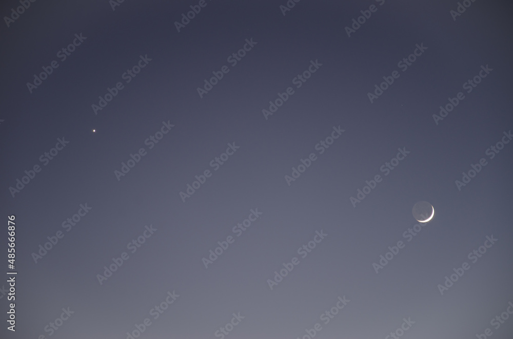 Polar star and waxing crescent moon. Gran Canaria. Canary Islands. Spain. Polar star and waxing crescent moon. Gran Canaria. Canary Islands. Spain.