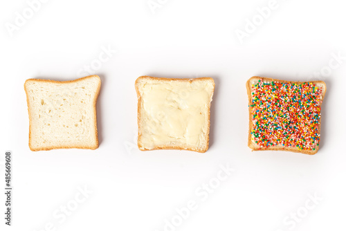 Traditional Australian fairy bread on plate isolated on white background. How to make fairy bread, traditional Australian children's party food